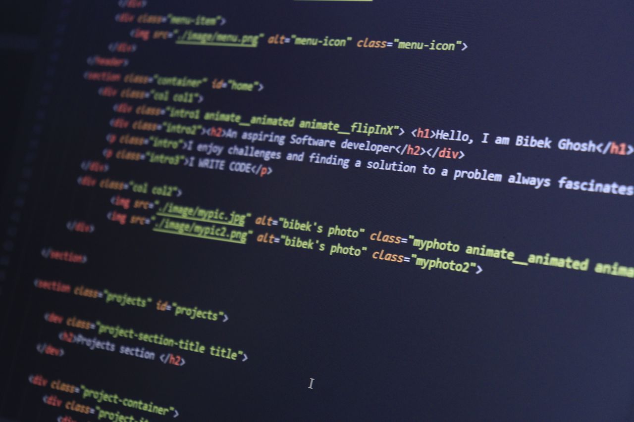 services-04 Colorful HTML code displayed on a computer screen for programming projects.